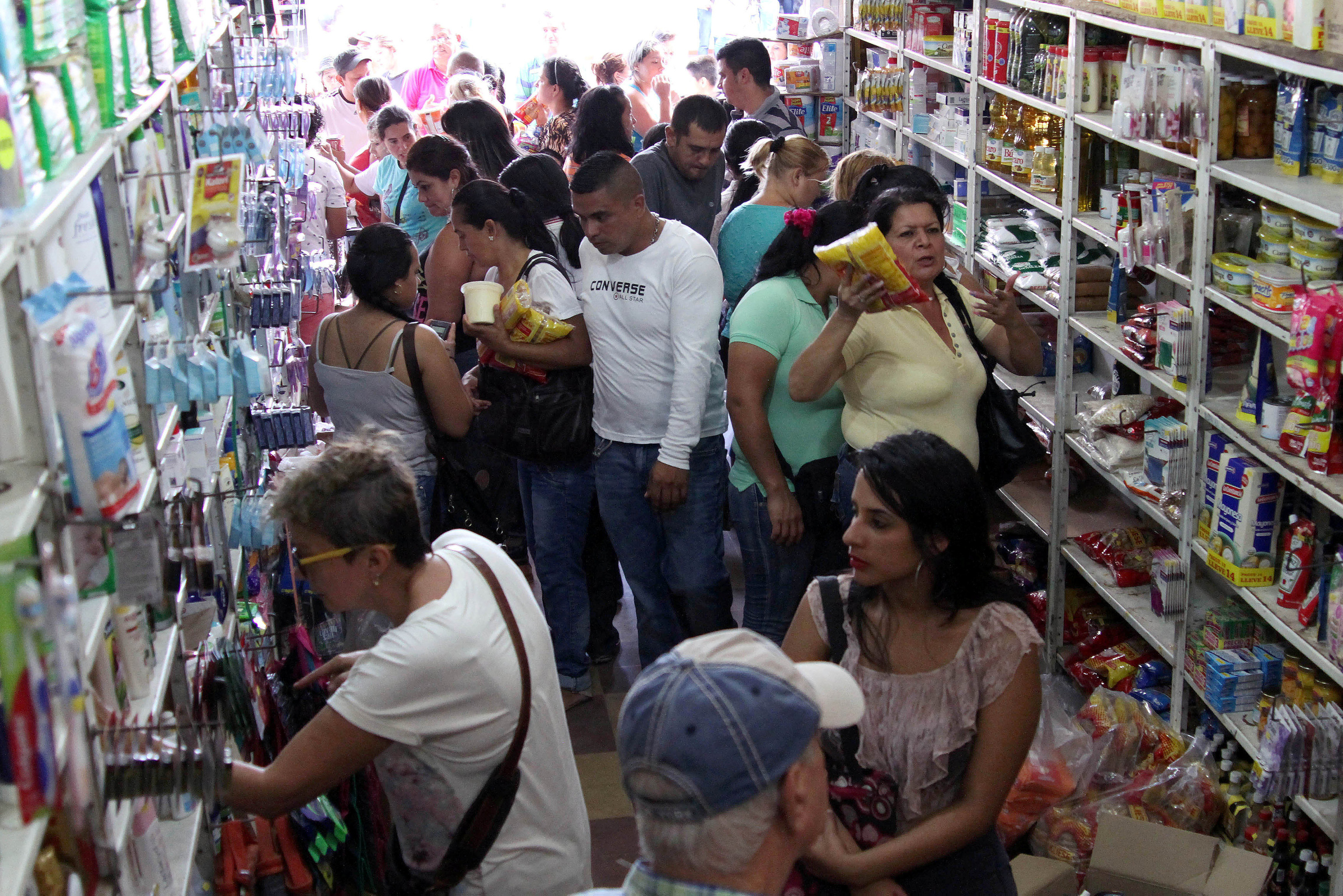 Venezuelans buy goods at a local supermarket in Cucuta, Colombia, July 10, 2016, during a temporary border opening. (CNS photo/Manuel Hernandez, Reuters)