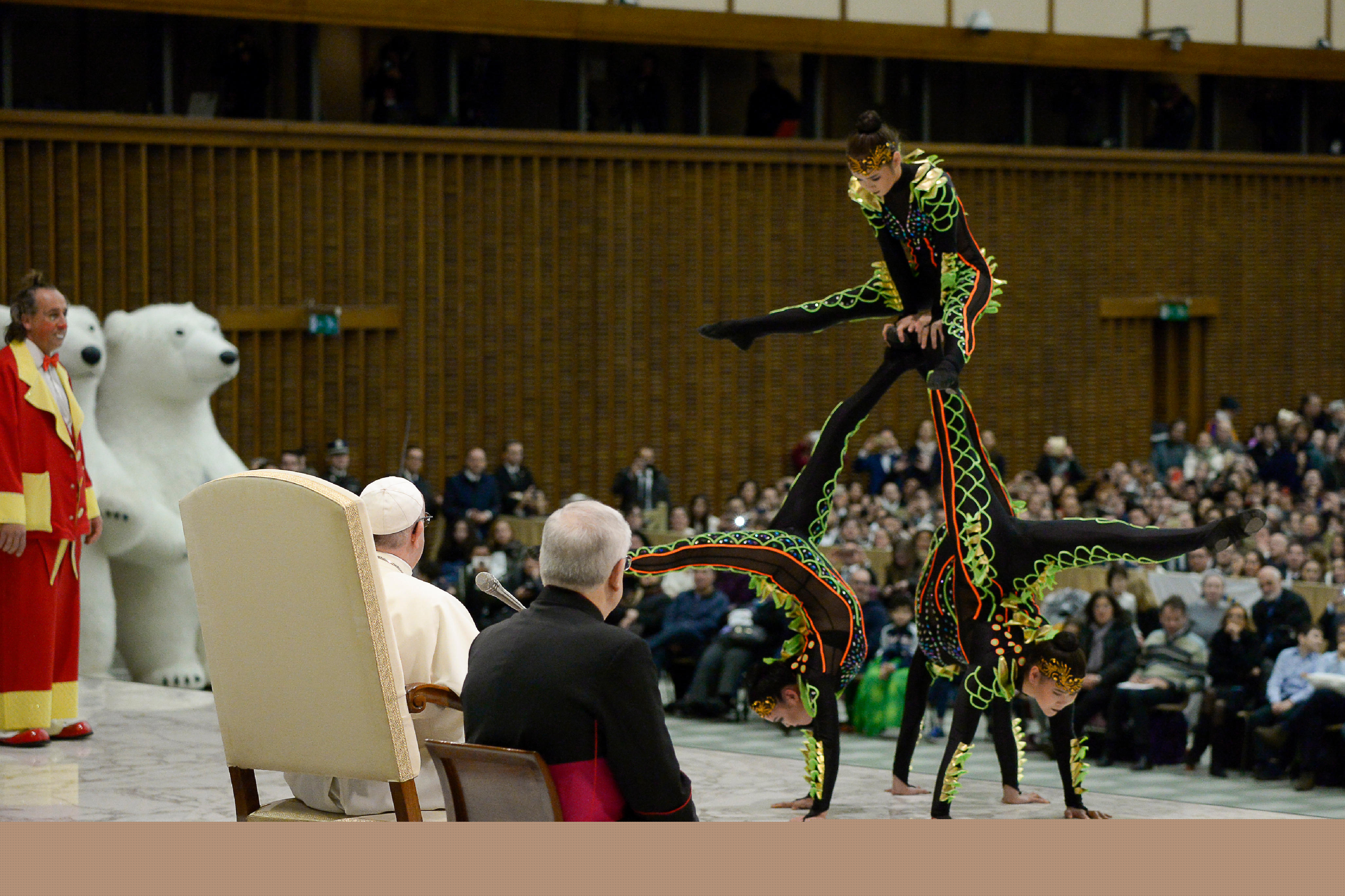 Members of Italy's Golden Circus perform for Pope Francis during his general audience in Paul VI hall at the Vatican Dec. 27. (CNS photo/L'Osservatore Romano) 