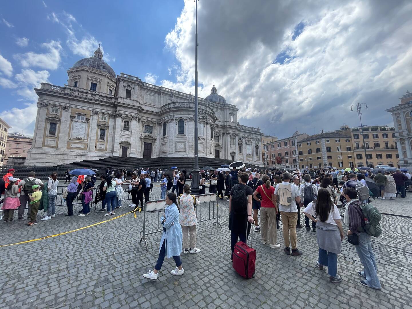 Hundreds of pilgrims wait behind Rome's Basilica of St. Mary Major to pay their respects at Pope Francis' tomb. (Photo by JD Long Garcia)