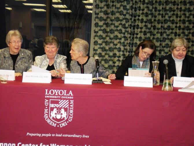  Sister Jean Wincek (second from left), Sister Mary Ann Zollmann (center) and Dr. Margaret Cain McCarthy (second from right)