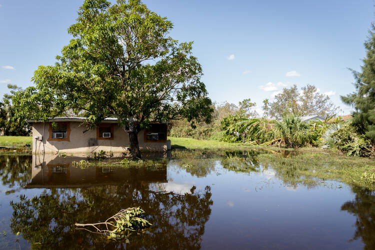 Mobile homes and farmworker housing in Immokalee, Fla., are seen flooded on Sept. 12 after Hurricane Irma swept up through Florida, leaving many in Southwest Florida without housing. The hurricane also severely impacted the region's infrastructure, including electricity, gasoline, internet and mobile telephone services. (CNS photo/Tom Tracy)