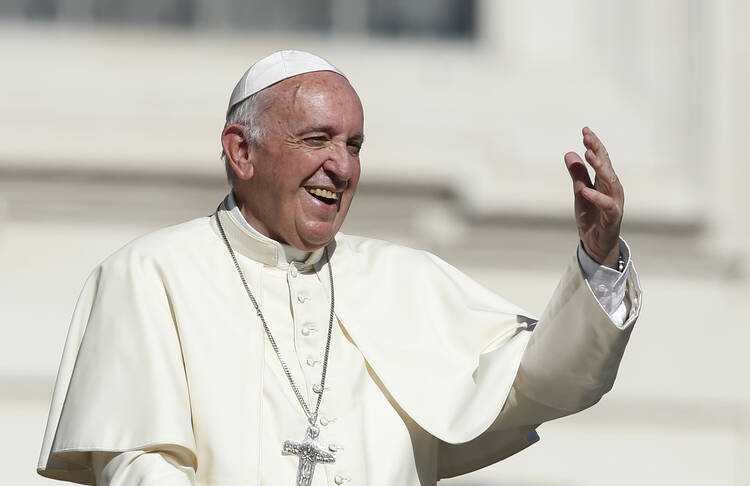 Pope Francis gestures as he leaves his general audience in St. Peter's Square at the Vatican Oct. 11. (CNS photo/Paul Haring) 