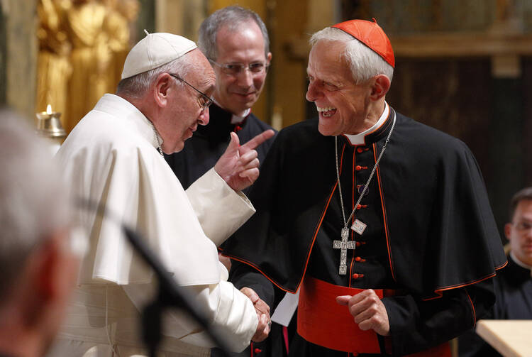 Pope Francis talks with Cardinal Donald W. Wuerl of Washington during a meeting with U.S. bishops in the Cathedral of St. Matthew the Apostle in Washington Sept. 23, 2015. (CNS photo/Paul Haring)
