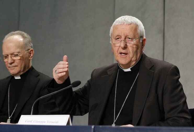 Cardinal Giuseppe Versaldi, prefect of the Congregation for Catholic Education, speaks at a news conference on Jan. 29, 2018.