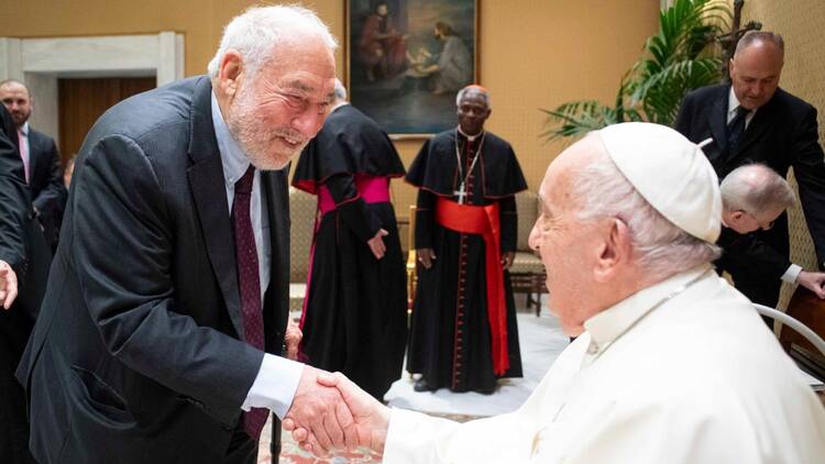 Pope Francis greets Professor Joseph Stiglitz at the "Debt Crisis in the Global South" meeting at the Vatican in June 2024 (Vatican Media)