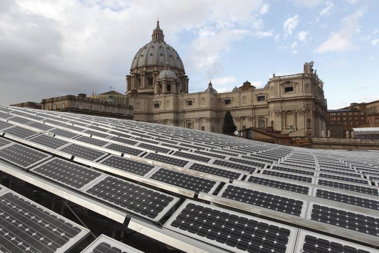 Solar panels on the roof of the Paul VI audience hall at the Vatican in this Dec. 1, 2010, file photo. The installation had been approved by Pope Benedict XVI in 2008. Pope Francis released his landmark environmental encyclical "Laudato Si'" 10 years ago May 24, 2015. (CNS photo/Paul Haring)