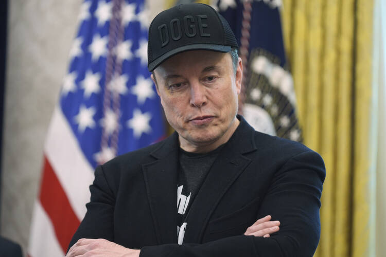 Elon Musk attends a news conference with President Donald Trump in the Oval Office of the White House on May 30. (AP Photo/Evan Vucci)