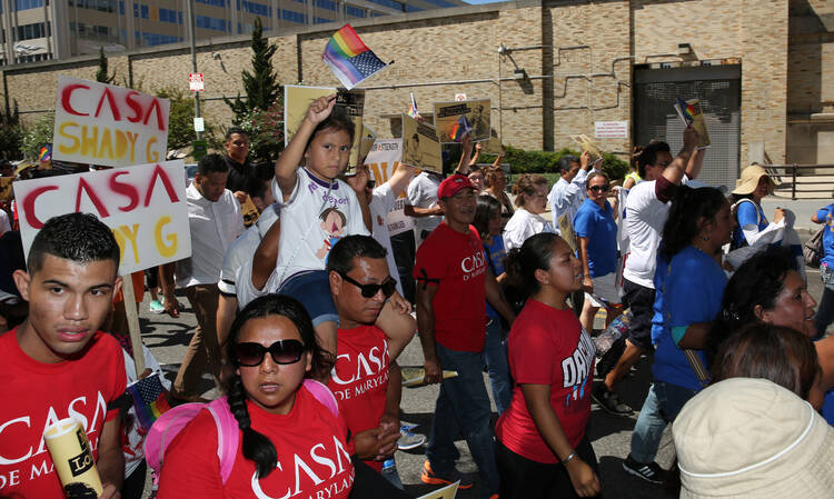 An immigration march and rally near the U.S. Immigration and Customs Enforcement headquarters in Washington on Aug. 28. (CNS photo/Bob Roller) 