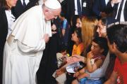 Heart to Heart. Pope Francis greets a Muslim woman as he meets residents at the Moria refugee camp on the island of Lesbos, Greece, on April 16.