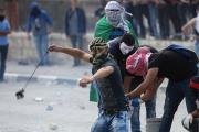 TENSIONS MOUNT. Palestinian protesters clash with Israeli soldiers in Bethlehem, West Bank, on Oct. 6.