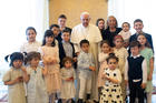 Pope Francis poses during an audience with a delegation from the Institute of the Innocents, a Florence-based organization dedicated to caring for children. The pope met the delegation at the Vatican May 24, 2019, during an audience marking the 600th anniversary of the Italian institute. (CNS photo/Vatican Media)