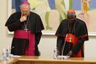 Archbishop Arthur Roche, then secretary of the congregation, left, and Cardinal Robert Sarah, then prefect of the Congregation for Divine Worship and the Sacraments, pray with U.S. bishops at the start of a meeting at the congregation at the Vatican on Jan. 14, 2020. (CNS photo/Paul Haring) 