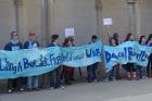 Pax Christi Toronto members gather in 2015 at the "Soldiers' Tower on campus at the University of Toronto, during its annual Peace Walk to mark The International Day of Peace. (Photo courtesy of Pamela Carriere)