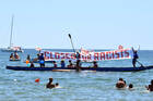 People join a demonstration titled, "City Flotilla, at Sea Against Racism," to protest against the scheduled arrival of the C Star, a ship that an anti-immigrant group has chartered to try and halt migrant arrivals to Europe from Africa and elsewhere, in Catania, Sicily Island, Italy, on July 29. (Orietta Scardino/ANSA via AP)